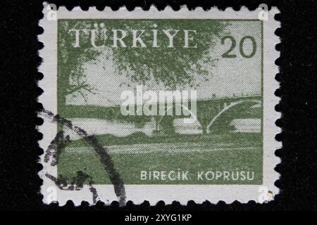 ISTANBUL, TURKEY - DECEMBER 25, 2020: Turkish stamp shows Birecik Bridge Stock Photo