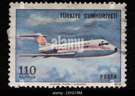 ISTANBUL, TURKEY - DECEMBER 25, 2020: Turkish stamp shows Turkish Airlines airplane circa 1973 Stock Photo