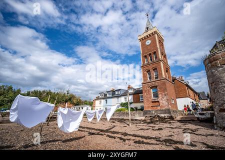 Lympstone, UK. 29th Aug, 2024. The tradition of residents drying washing on the foreshore of Lympstone in Devon. Credit: Thomas Faull/Alamy Live News Stock Photo