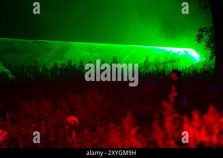 Thailand. 29th Aug, 2024. Visitors are walking inside a green tunnel at the 'Thailand Goosebumps Festival 2024, ' an event dedicated to ghosts, spirits, and long-held beliefs. The festival aims to create an exciting and mysterious atmosphere, connecting and promoting tourism through local legends, ghost stories, and sacred beliefs of the Thai people. The event is being held in a public park on the property of the State Railway of Thailand, Chiang Mai, Thailand. (Photo by /Sipa USA) Credit: Sipa USA/Alamy Live News Stock Photo