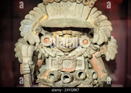 MEXICO CITY, Mexico — The intricately carved face of an Aztec goddess, likely Coyolxauhqui, on a monolithic stone discovered at the Templo Mayor site. This masterpiece of Mexica sculpture showcases the refined artistic style of the late Aztec period and provides insights into their religious iconography and cosmological beliefs. Stock Photo