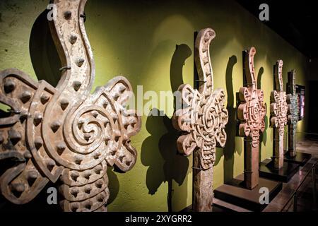 MEXICO CITY, Mexico — Archaeological excavation at the Cultural Corner of Spain in Mexico site, revealing Mexica stone sculptures and monumental clay battlements. This discovery provides insights into Aztec architectural practices and the extensive ruins that lie beneath modern Mexico City. Stock Photo