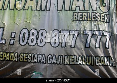 Old advert with telephone number, Ranau, Sabah, Malaysia Stock Photo ...