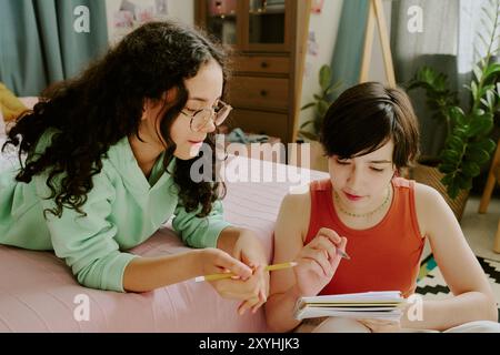 Collaborating on Project in Modern Living Room Stock Photo