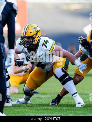 August 29, 2024: North Dakota State Bison guard Grey Zabel (74) prepares to make a block in the football game between Colorado and North Dakota State in Boulder, CO. Derek Regensburger/CSM. Stock Photo