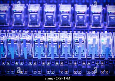 Close up Relay actuators inside the Industrial power case Stock Photo