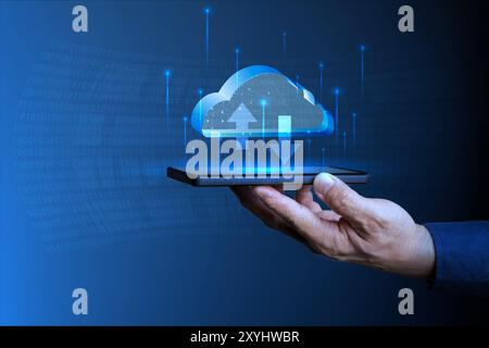 Hand showing smartphone with cloud network Computer connects to internet server service for cloud data transfer. Cloud computing technology and online Stock Photo