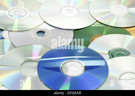 Pile of Compact Discs (CDs) on white background Stock Photo