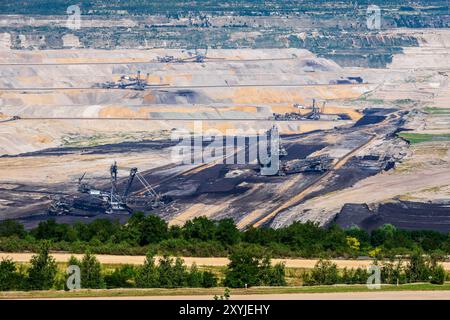 Giant bucket-wheel excavators on the bottom of the Hambach mine, a large open-pit coal mine in Germany, operated by RWE for mining lignite. Stock Photo