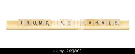 Miami, Florida 8-28-24 TRUMP VS HARRIS made with square wooden tile English alphabet letters with on a wood rack holder. 2024 presidential election co Stock Photo