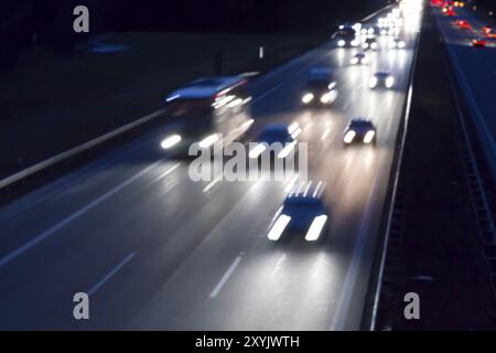 Traffic on the motorway at night Stock Photo