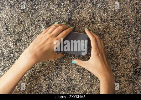 Top view of a client's hands cutting a tarot deck Stock Photo