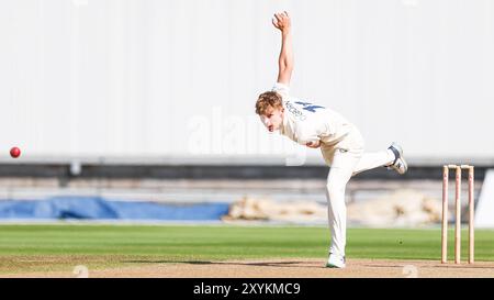 Birmingham, UK. 30th Aug, 2024. #11, Alfie Ogborne of Kent in action bowling during the Vitality County Championship Division One match between Warwickshire CCC and Kent CCC at Edgbaston Cricket Ground, Birmingham, England on 30 August 2024. Photo by Stuart Leggett. Editorial use only, license required for commercial use. No use in betting, games or a single club/league/player publications. Credit: UK Sports Pics Ltd/Alamy Live News Stock Photo