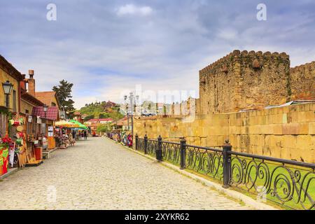 Mtskheta, Georgia, April 28, 2017: Street view with gift souvenir shops in old historical landmark town, Asia Stock Photo