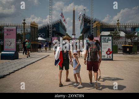 Specators head into Place de la Concorde during the 2024 Olympic Games, on Friday, August 2, 2024, in Paris, France. Stock Photo