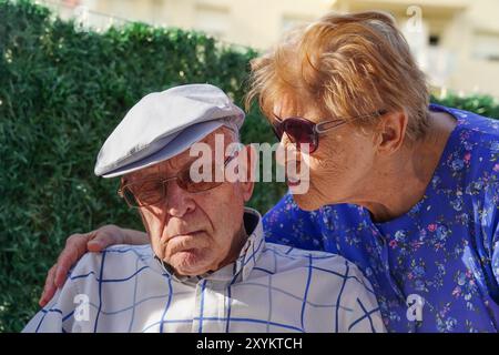 Portrait of senior man taking a nap in the terrace. Spanish tradition Stock Photo