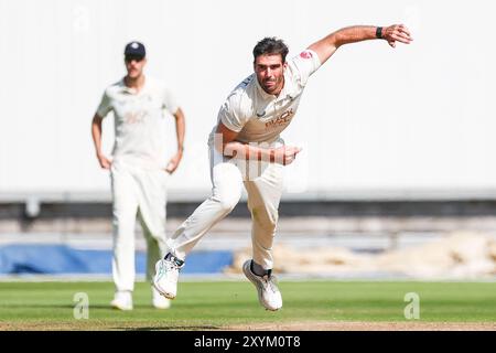 Birmingham, UK. 30th Aug, 2024. #9, Grant Stewart of Kent in action bowling during the Vitality County Championship Division One match between Warwickshire CCC and Kent CCC at Edgbaston Cricket Ground, Birmingham, England on 30 August 2024. Photo by Stuart Leggett. Editorial use only, license required for commercial use. No use in betting, games or a single club/league/player publications. Credit: UK Sports Pics Ltd/Alamy Live News Stock Photo