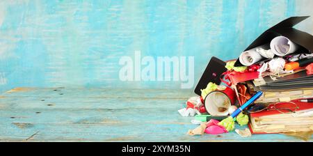 messy file folders on cluttered office desk,red tape, bureaucracy,aministration,overworked,burnout business concept,isolated on grungy backgound Stock Photo