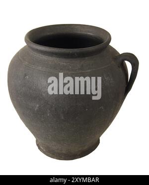 Clay pot of manual work. It is possible to store milk or other liquid Stock Photo