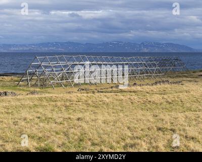 Drying racks for caught fish, on the shore of the Arctic Ocean, once a big industry and economic factor in the area, but the industry has been rendere Stock Photo