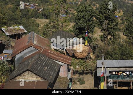 Corn on the cob stored in front of a farmhouse in Nepal. Scene near Bhulbhule, Annapurna Conservation Area Stock Photo