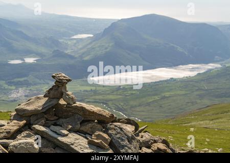 View from the summit of Mount Snowdon, Snowdonia, Gwynedd, Wales, UK, looking west towards Llyn Cwellyn and the coast Stock Photo