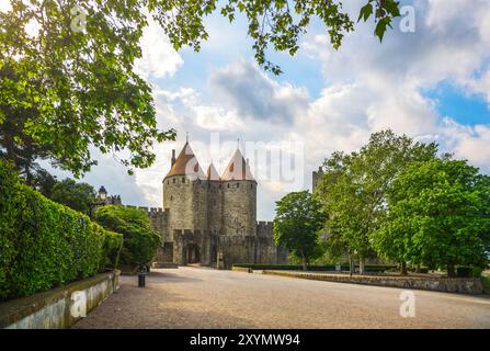 Carcassonne, the entrance to the medieval fortified city La Cité. Department of Aude, Occitania region, France Stock Photo