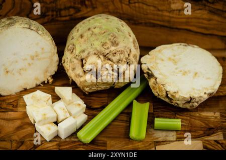Celery, Celeriac, Turnip-rooted celery, Knob celery (Apium graveolens var. rapaceum, Apium graveolens rapaceum, Apium rapaceum), halved and diced Stock Photo