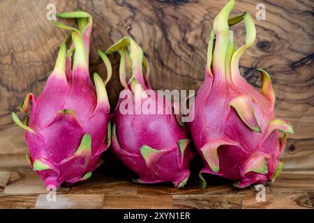 Red pitahaya, Strawberry pear, Night-blooming cereus (Cereus triangularis, Hylocereus triangularis, Hylocereus undatus), ripe dragon fruit Stock Photo