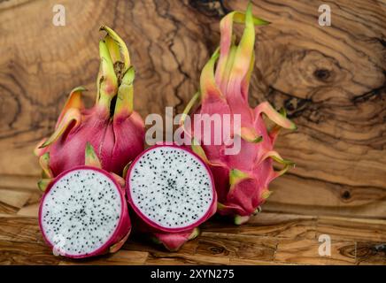 Red pitahaya, Strawberry pear, Night-blooming cereus (Selenicereus undatus), ripe dragon fruit, cut Stock Photo