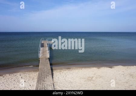 Beach with pier in Hel town at Baltic Sea (Puck Bay), Hel Peninsula, Poland, Europe Stock Photo