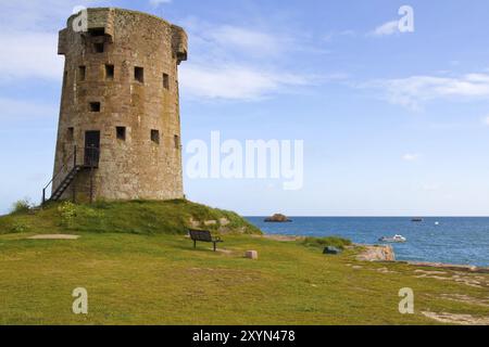 Historic Le Hocq defence tower on the coast of Jersey, UK Stock Photo