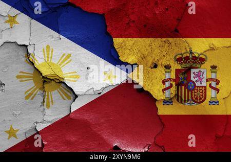 Flags of Philippines and Spain painted on cracked wall Stock Photo