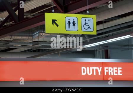 Illuminated sign of a duty free shop on an airport Stock Photo