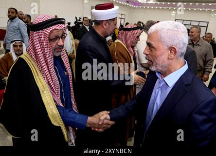 Gaza, Palestine. 30 April 2022. Yahya Al-Sinwar, the head of the Islamic Resistance Movement of Hamas attends a meeting with other politicians, military officials, and academics, in Gaza City. During the meeting Sinwar spoke about the ongoing Israeli occupation, the recent attacks at the Al Aqsa Mosque by Israeli forces, and Knesset member Mansour Abbas Stock Photo