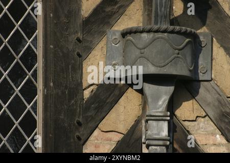Artistically designed rain gutter at Cecilienhof Palace in Potsdam Stock Photo