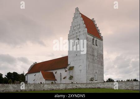 The famous medieval, late Gothic Fanefjord Church on the island of Moen, Denmark. The church is known for its marvellous murals. The famous medieval F Stock Photo