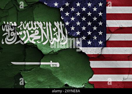 Flags of Saudi Arabia and USA painted on cracked wall Stock Photo