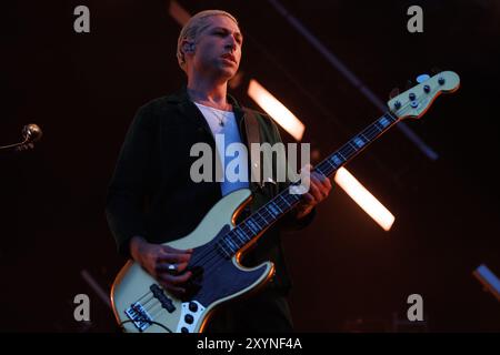 BARCELONA, SPAIN - JUN 26: Michael Shuman, bass player of Queens of the Stone Age (American rock band), performs on stage at Poble Espanyol on June 26 Stock Photo