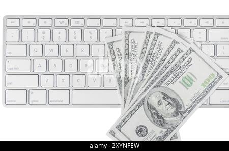 US hundred dollar bills with white computer keyboard isolated on white background Stock Photo