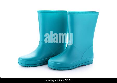 Blue rubber boots isolated on white background. Kids shoes for water. Stock Photo