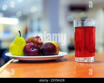 Fruit plate with fruit juice. Stock Photo