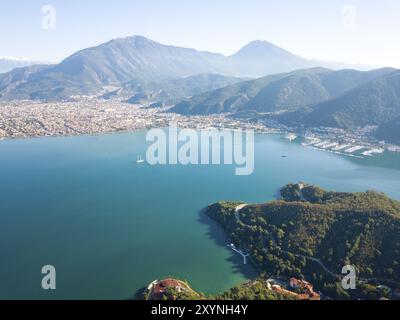 Drone aerial view of Mediterranean Sea, mountains behind coastal city of Fethiye, Turkey, Asia Stock Photo