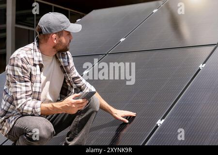 Production, installation and maintenance of industrial solar panels. Stock Photo