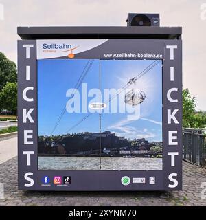 Riverside ticket booth selling rides on the Seilbahn cable cars which take tourists from Koblenz across the Rhein River up to Ehrenbreitstein Fortress. Stock Photo