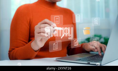Businesswoman using laptop, Document management system concept, Folders and document icon software, Online document database file management Powerful Stock Photo