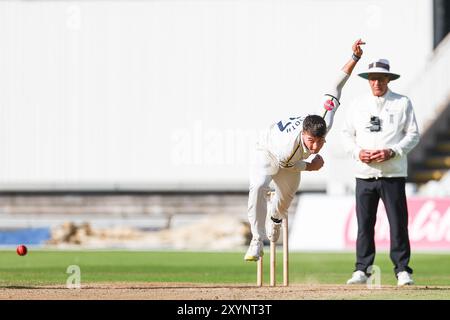 Birmingham, UK. 30th Aug, 2024. #27, Michael Booth of Warwickshire in action bowling during the Vitality County Championship Division One match between Warwickshire CCC and Kent CCC at Edgbaston Cricket Ground, Birmingham, England on 30 August 2024. Photo by Stuart Leggett. Editorial use only, license required for commercial use. No use in betting, games or a single club/league/player publications. Credit: UK Sports Pics Ltd/Alamy Live News Stock Photo