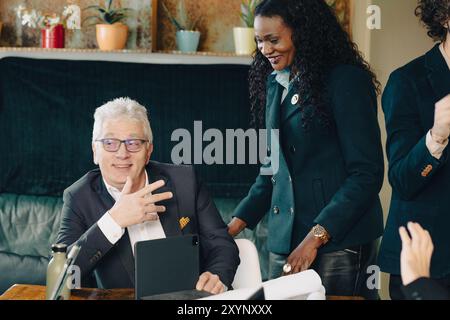 Business team is having a productive meeting, discussing work on a project Stock Photo