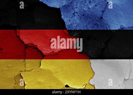 Flags of Germany and Estonia painted on cracked wall Stock Photo