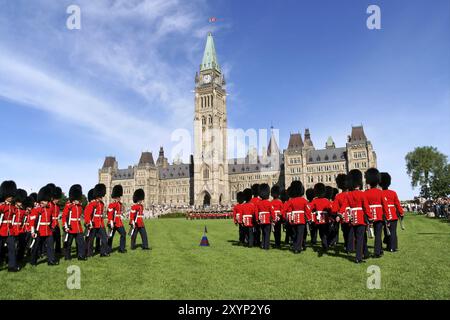 Ottawa, Canada, August 08, 2008: changing of the guard in front of the Parliament of Canada on Parliament Hill in Ottawa, Canada. A lot of tourist att Stock Photo